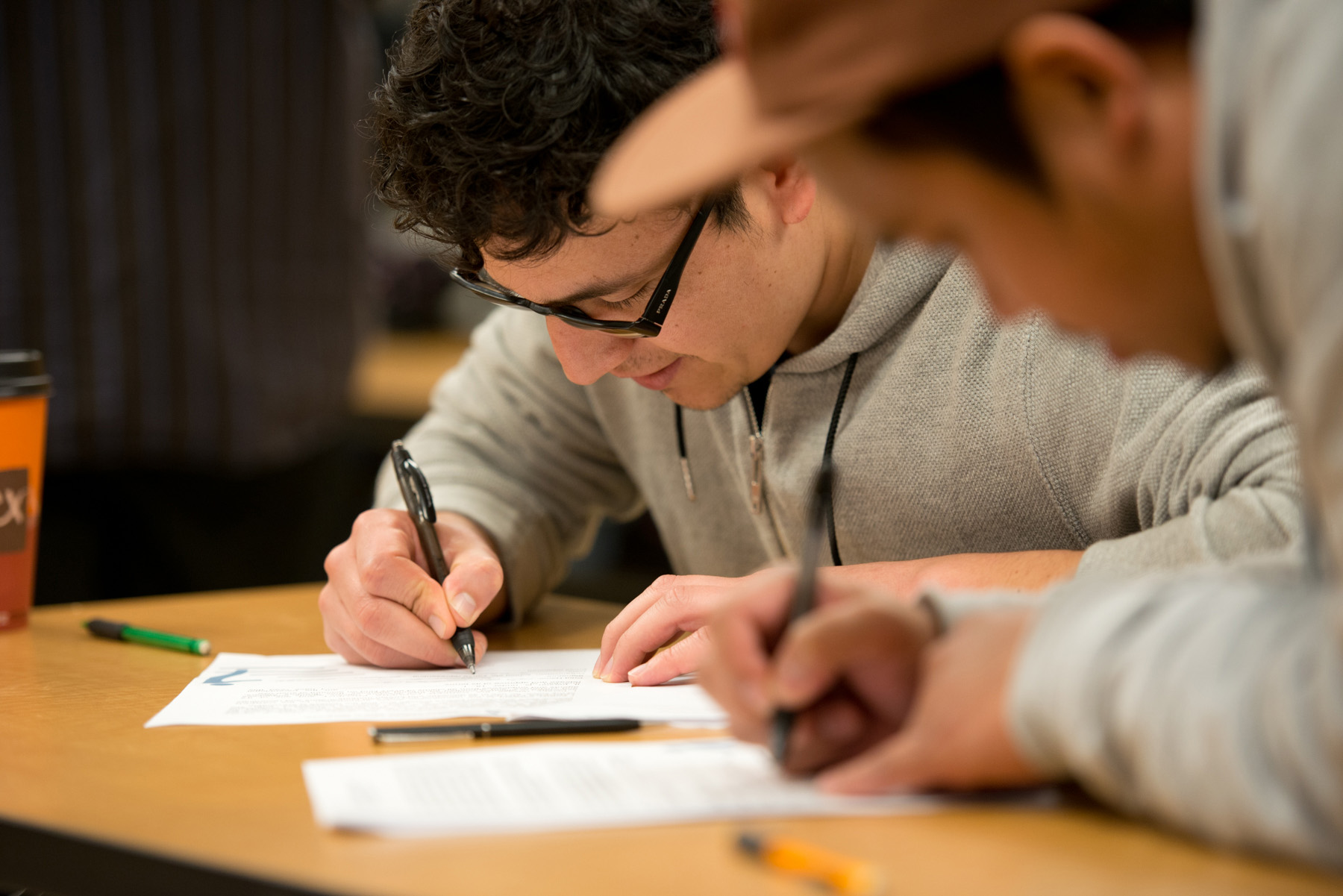 Four students work on an interactive classroom crime scene