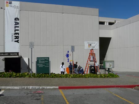 far shot of empty concrete wall before mural