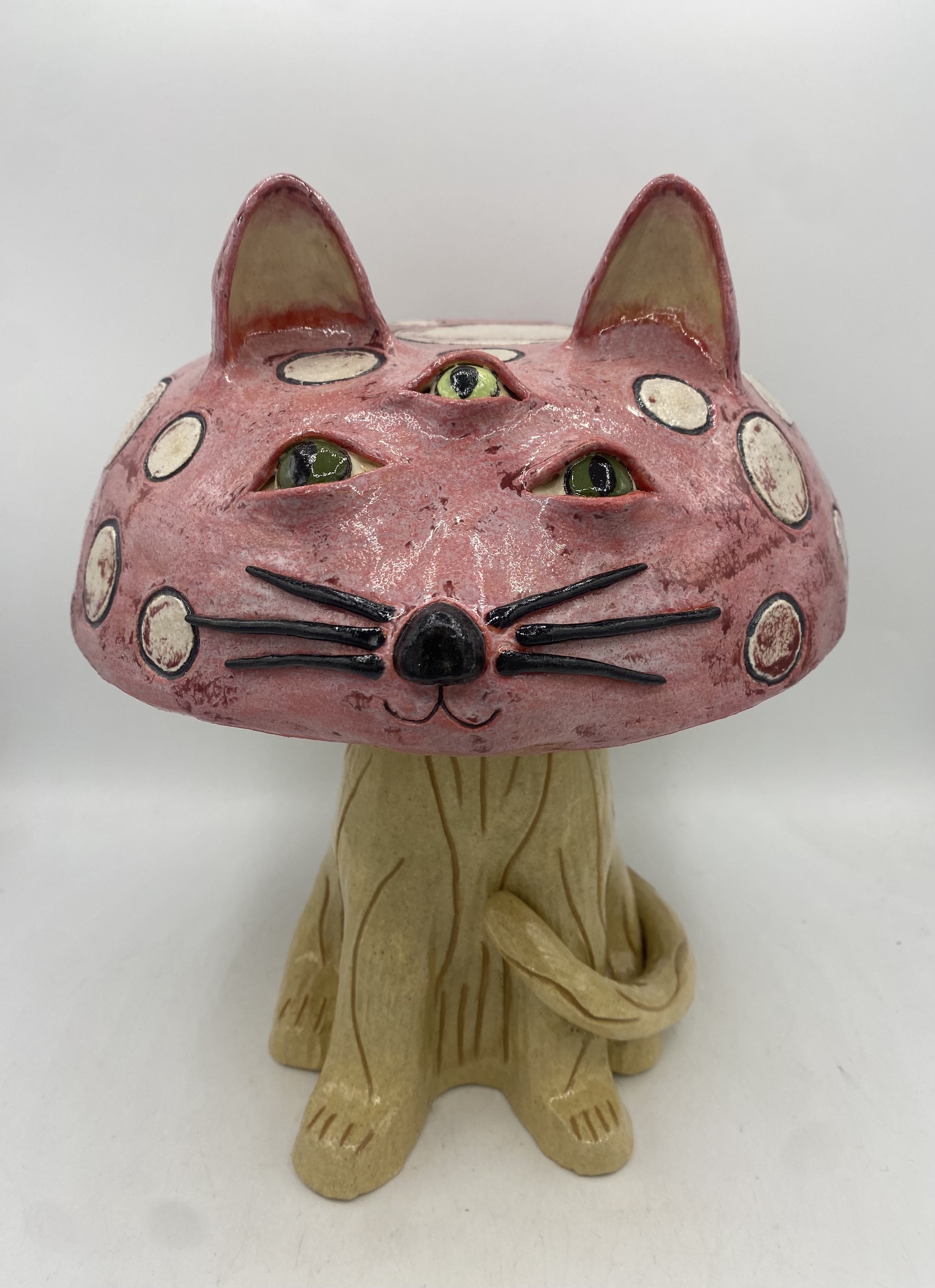 Ceramic cat with a third eye