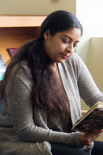 A student reading at the library