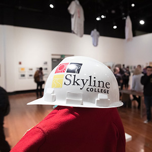a safety hat with a Skyline College logo